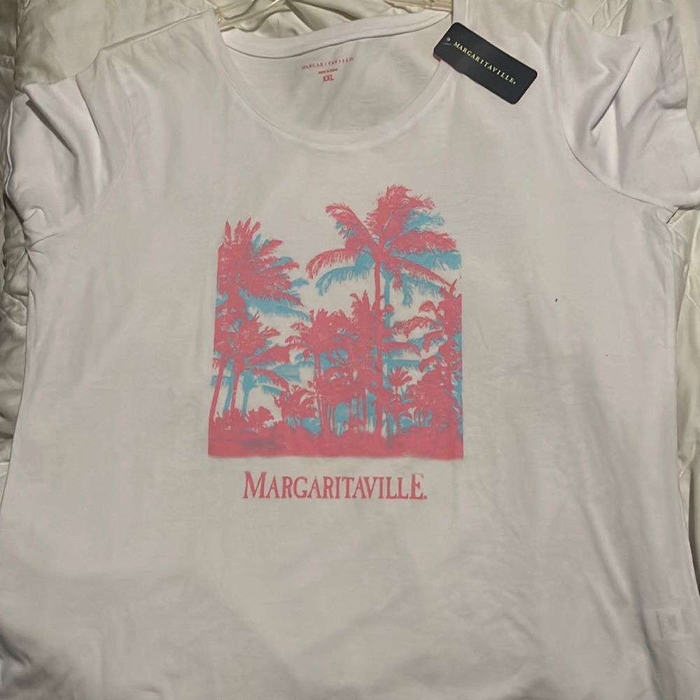 I’m selling a new margarita ville shirt with tags, never worn